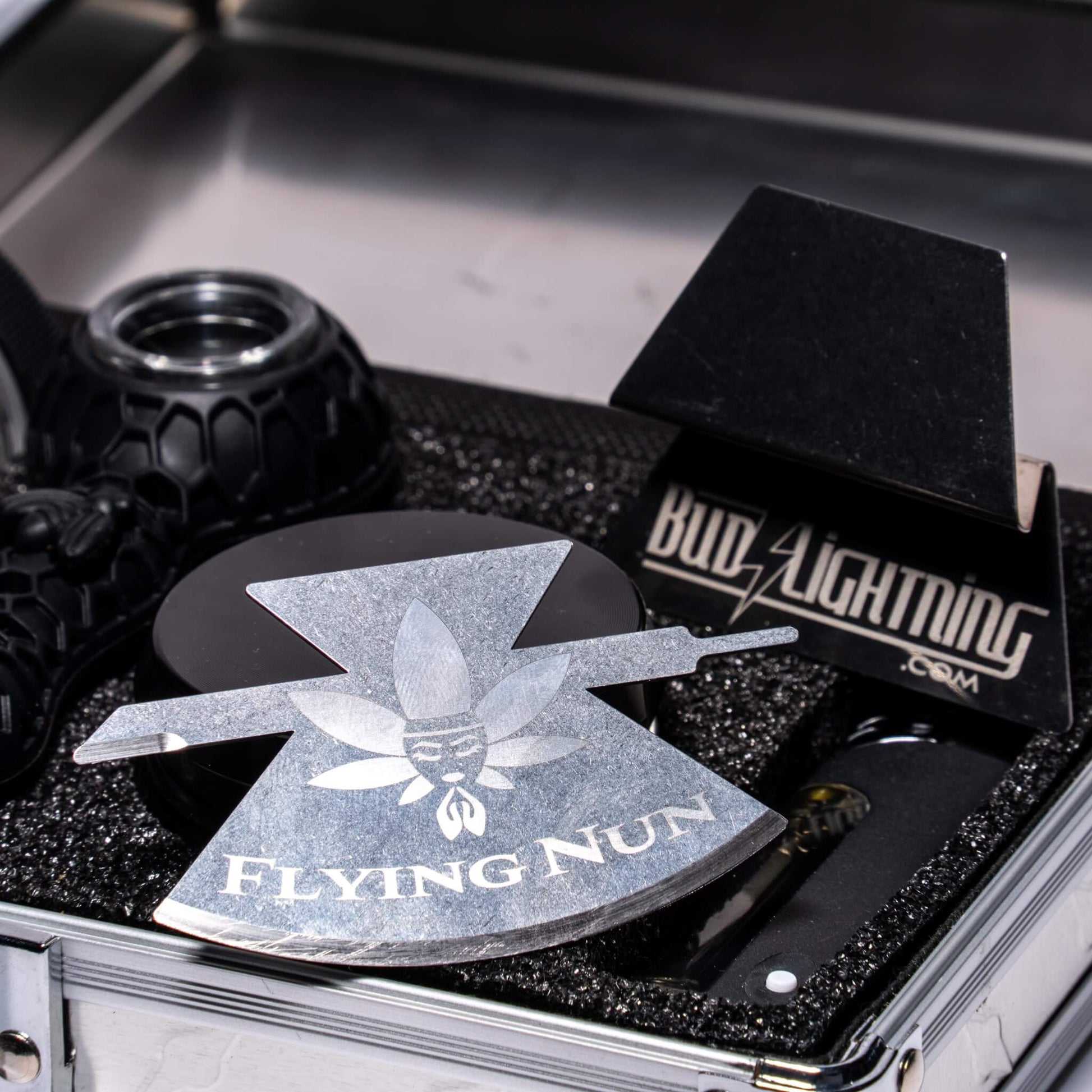 Flying Nun cannabis accessory used to help manage sticky cannabis flower during grinding and preparation.