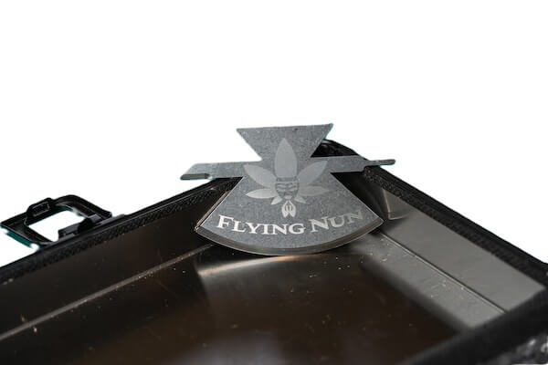 Flying Nun cannabis preparation tool designed to make cannabis handling easier for people with reduced hand dexterity.